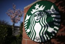 Starbucks Falls as New CEO Schultz Suspends Buyback Plan