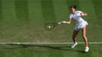 Tennis-Raducanu given Wimbledon reality check by Garcia