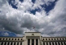 Fed leaves rates unchanged, but signals no rush to cut amid ‘elevated’ inflation
