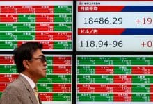 Asian stocks edge higher as inflation dust settles, Japan surges