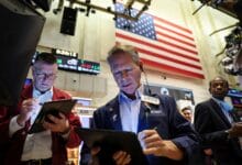 Futures extend rally on earnings optimism