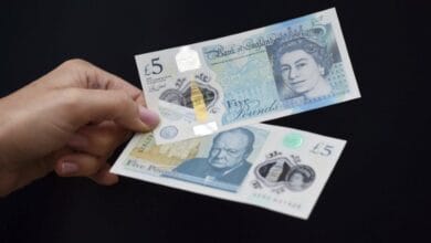 Pound stutters as debate on BoE rate hike path heats up