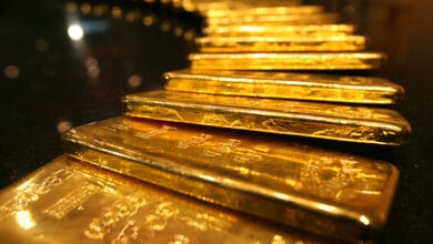 Gold rises from steep losses after BOJ shock, copper rebounds
