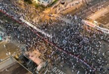 Thousands join Israeli judicial protests in shadow of attacks