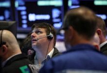 Wall Street eyes higher open as investors cheer Apple earnings
