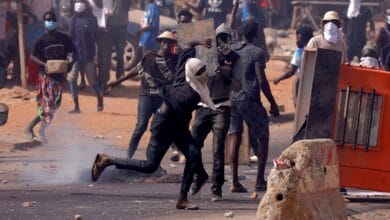 Senegal protesters and police clash again as death toll rises to 10