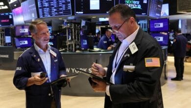 Futures muted as Wall St awaits more big bank earnings