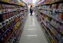 Japan wholesale inflation slows again, bolstering case for stimulus