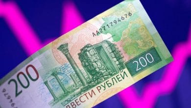 Russian central bank to hold emergency rate meeting as rouble tumbles