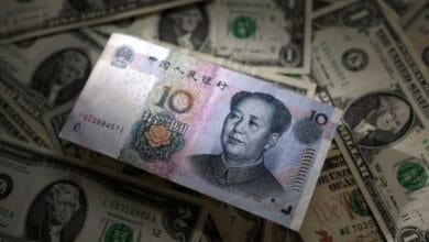 Exclusive-China’s state banks seen selling dollars for yuan in London and New York hours