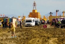 Burning Man festival exodus begins through drying mud