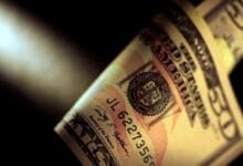 Asian currencies hit by dollar recovery