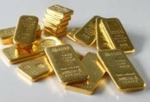 Gold prices rangebound as Fed reiterates higher-for-longer rates
